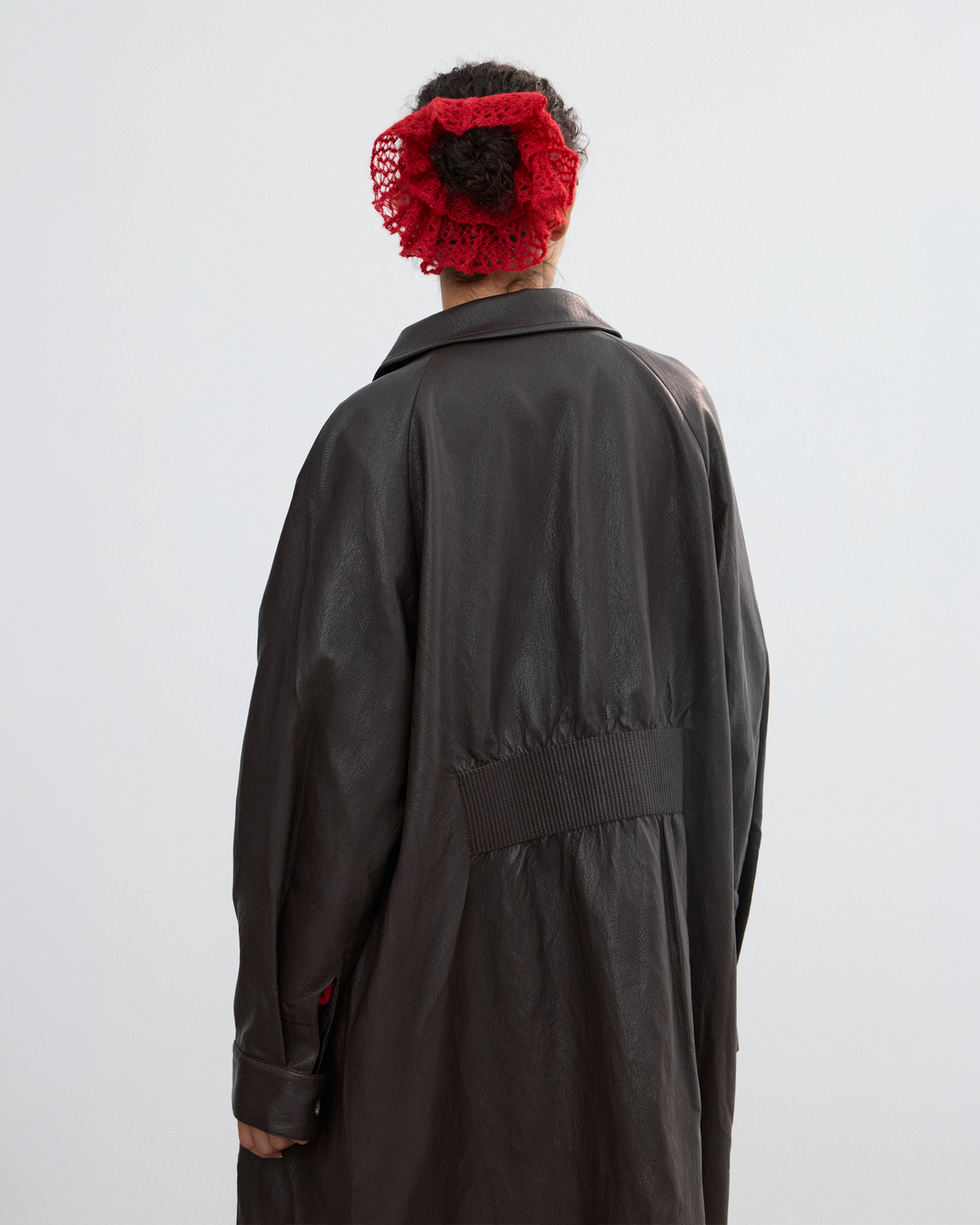 BACK PLEATED FAUX LEATHER COAT