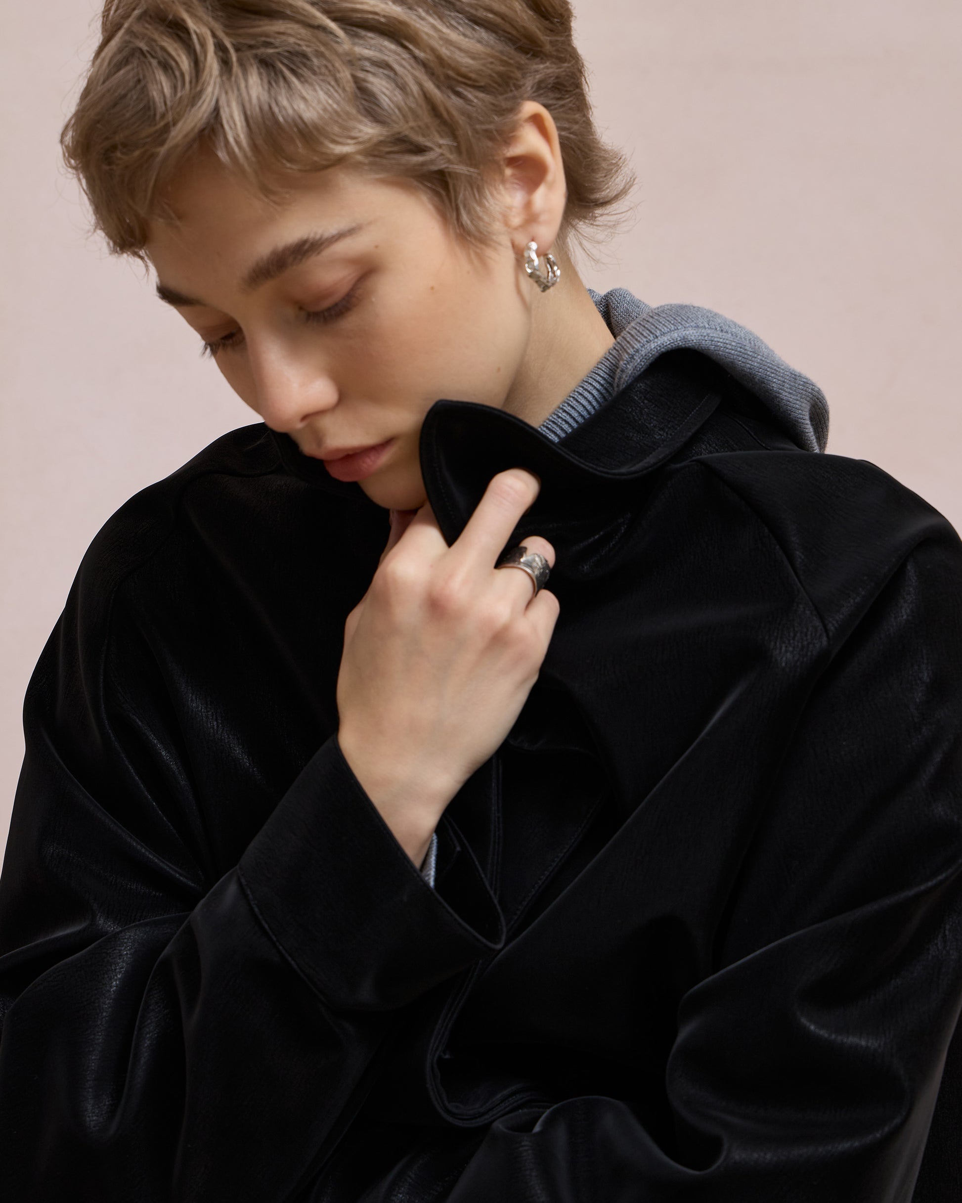 BACK PLEATED FAUX LEATHER COAT