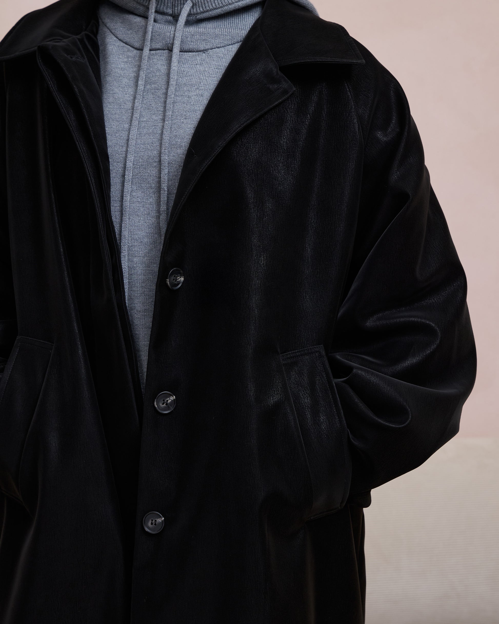 BACK PLEATED FAUX LEATHER COAT