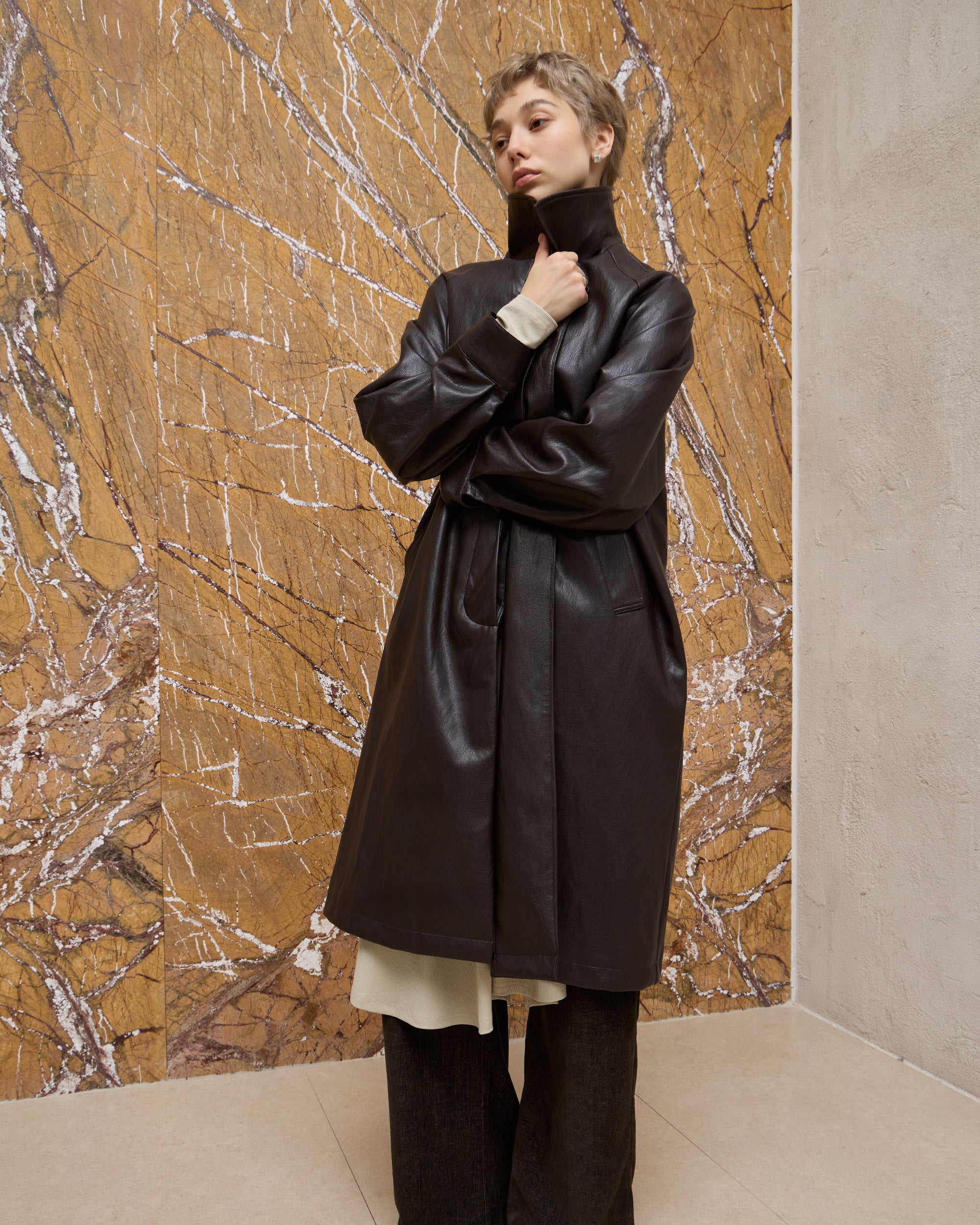 BACK PLEATED FAUX LEATHER COAT