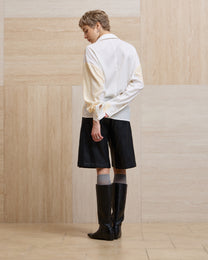 PLEATED FAUX LEATHER SHORTS