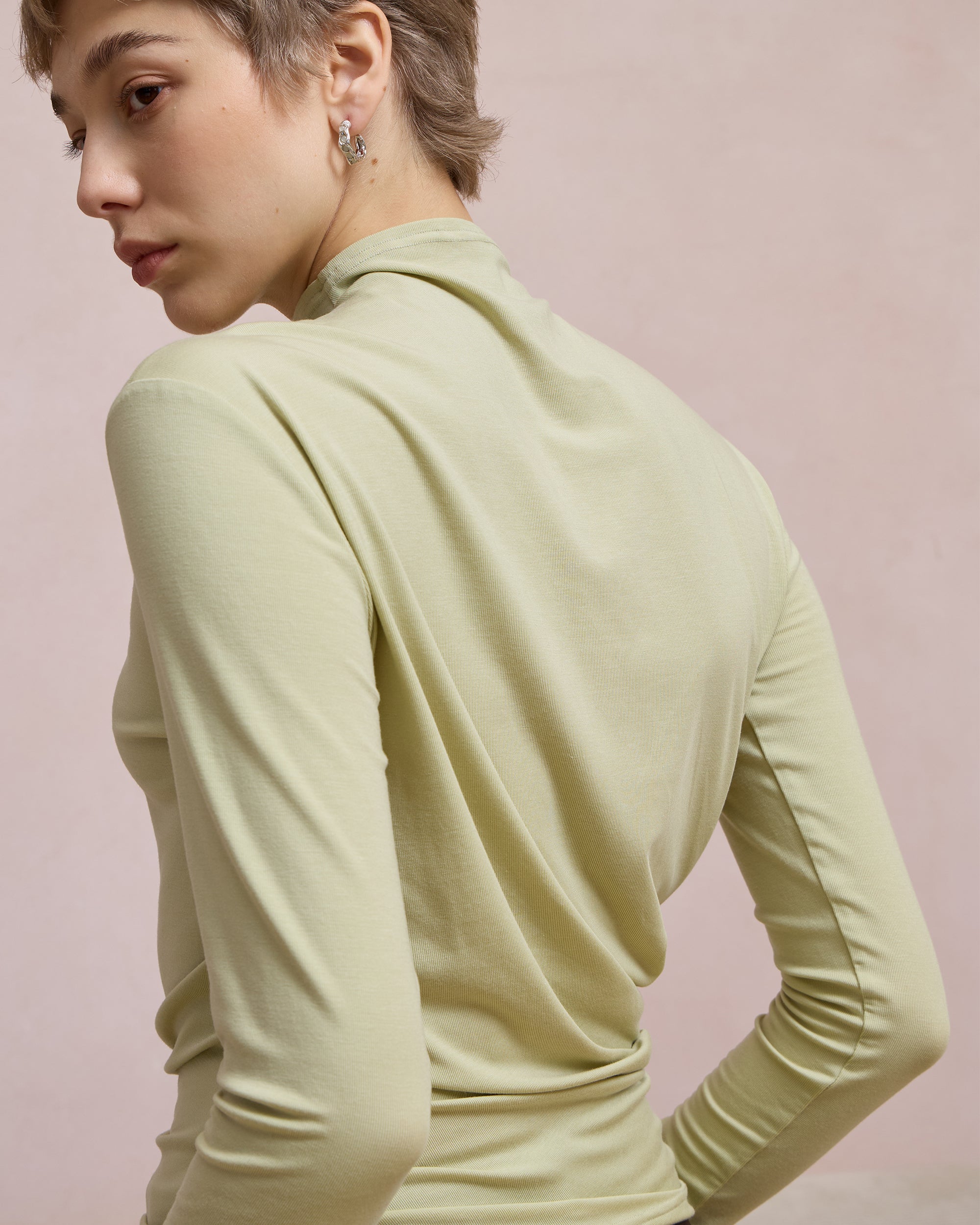 TWISTED MOCK NECK TOP