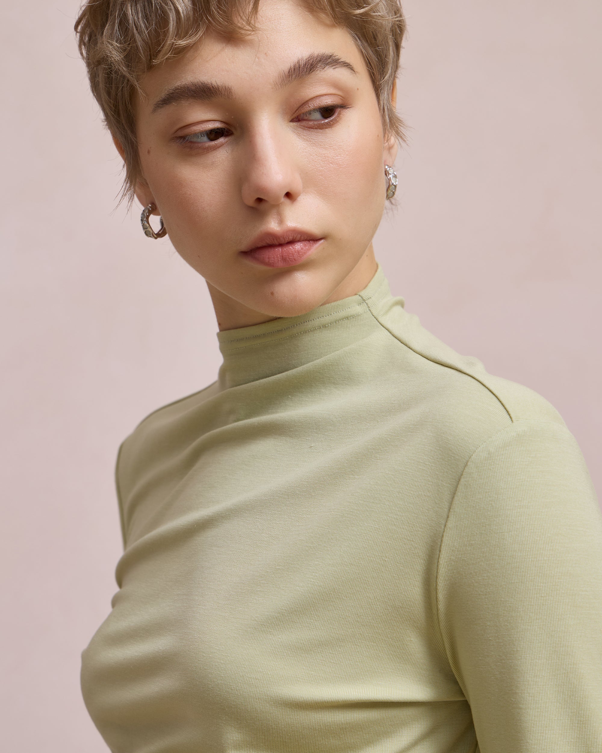 TWISTED MOCK NECK TOP