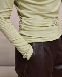 TWISTED MOCK NECK TOP