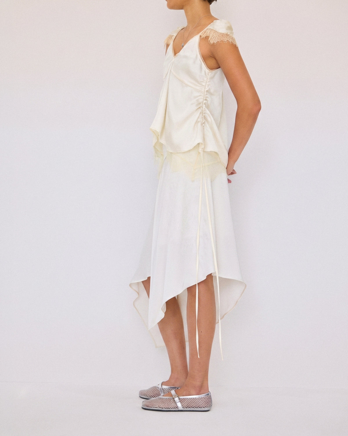 DRAPED EMBROIDERED ASYMMETRIC SKIRT