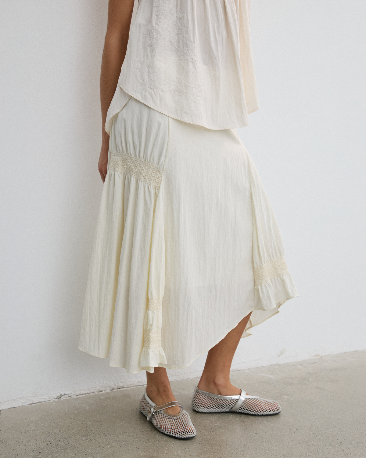 IRREGULAR PLEATED FLARE SKIRT