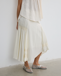 IRREGULAR PLEATED FLARE SKIRT
