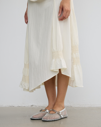 IRREGULAR PLEATED FLARE SKIRT