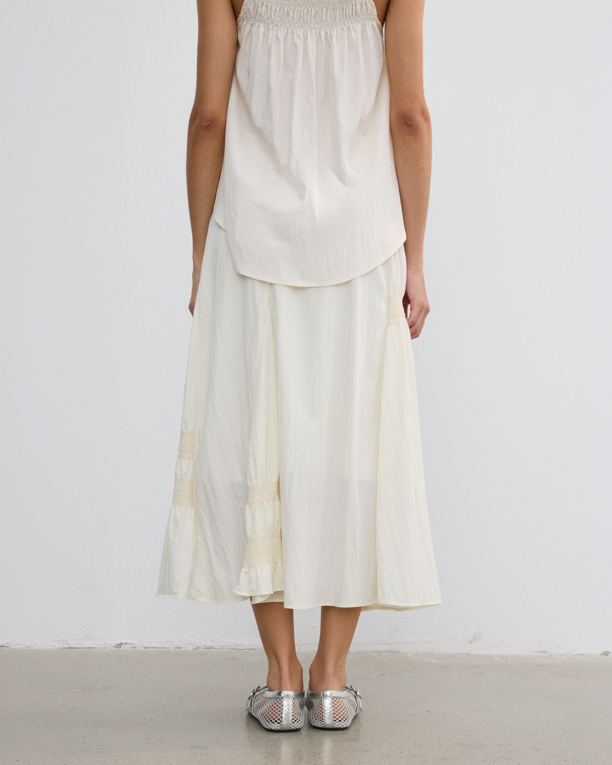 IRREGULAR PLEATED FLARE SKIRT