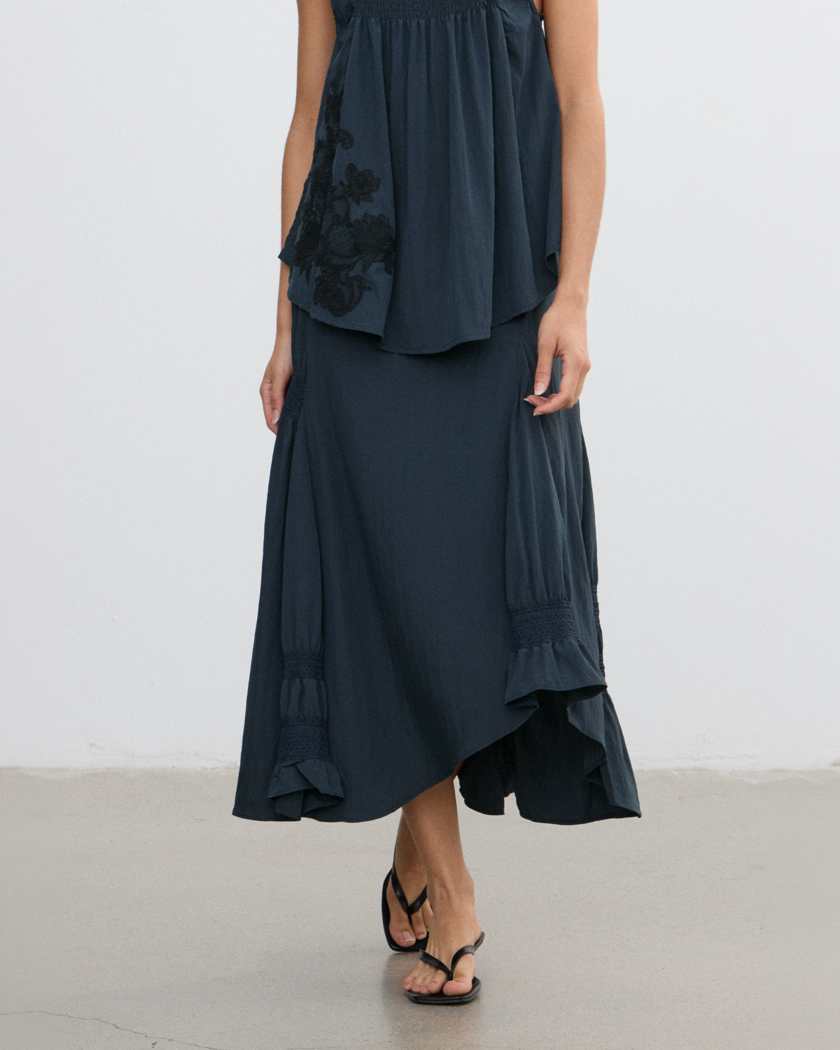 IRREGULAR PLEATED FLARE SKIRT